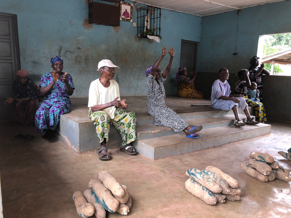 Persons affected by leprosy show their joy for the relief material